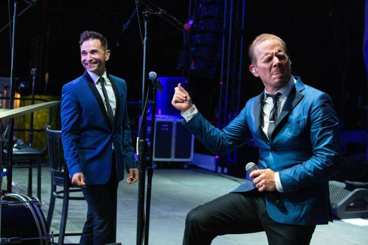 Travis Cloer, left, and Christian Hoff are shown onstage at "The Rockin' Retro Drive-In Show" a ...