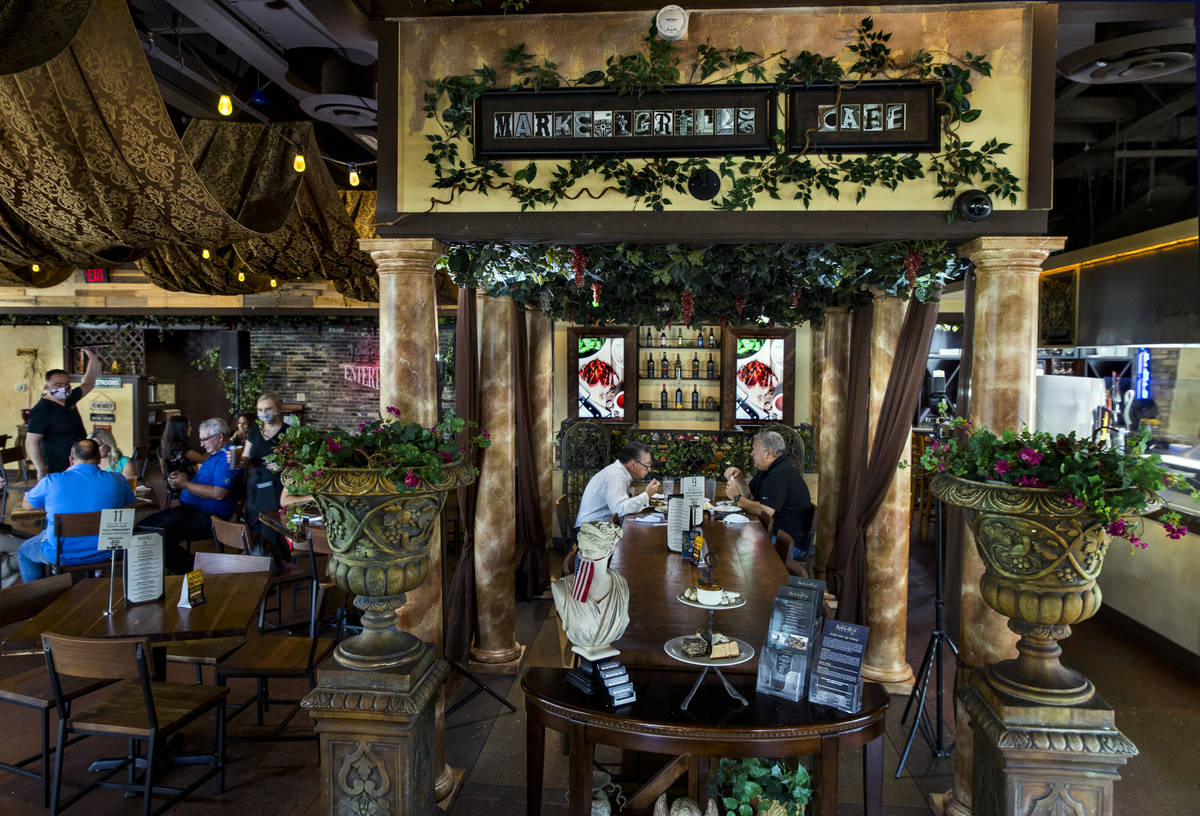 The lunchtime crowd begins to arrive at the Market Grille Cafe which is still thriving during t ...