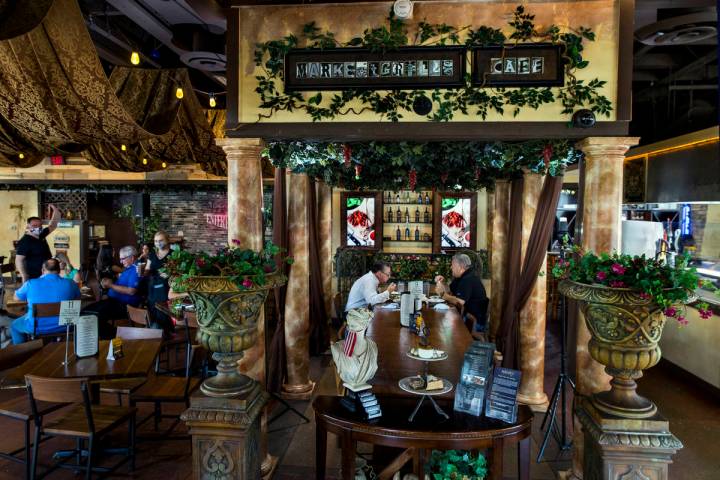 The lunchtime crowd begins to arrive at the Market Grille Cafe which is still thriving during t ...