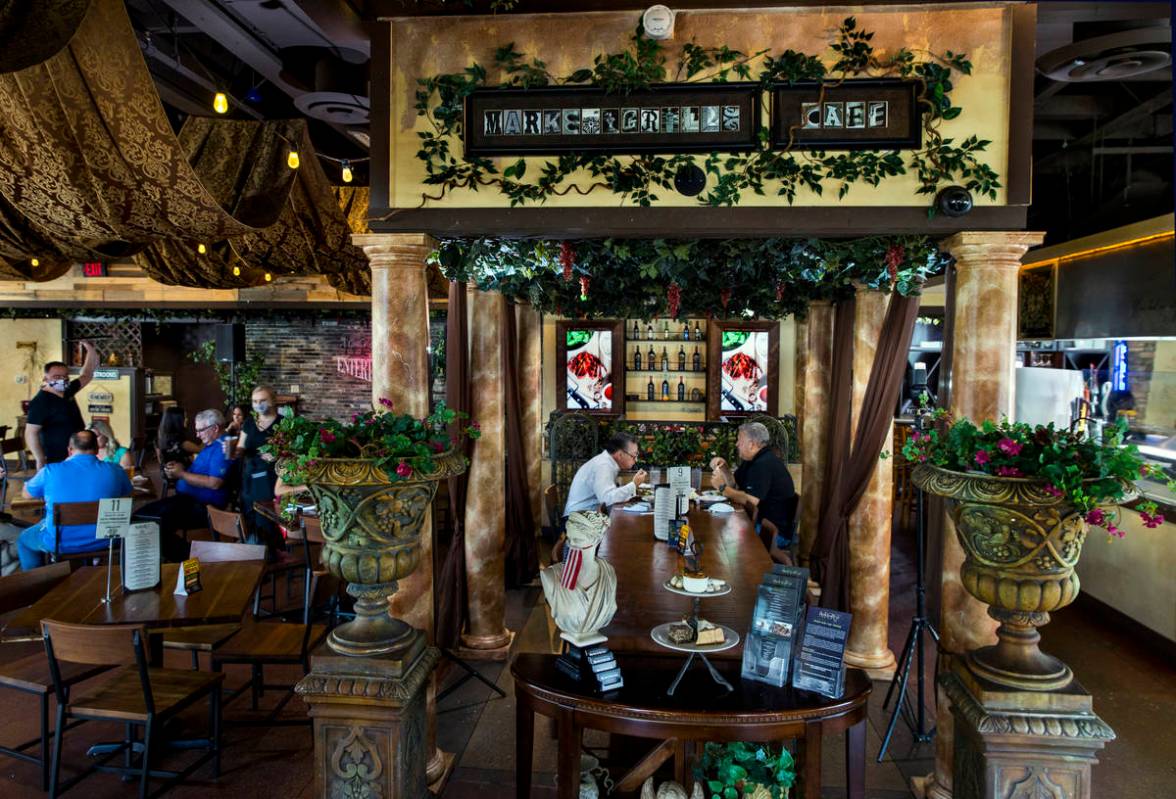 The lunchtime crowd begins to arrive at the Market Grille Cafe which is still thriving during t ...