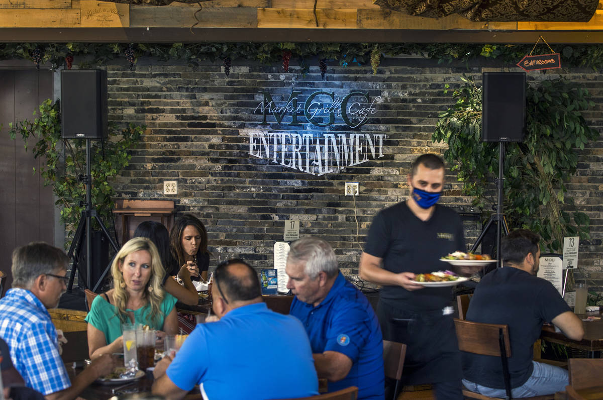The lunchtime crowd begins to arrive at the Market Grille Cafe which is still thriving during t ...