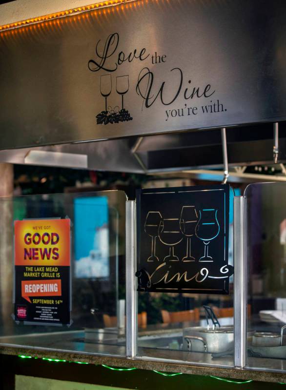 A grill in the center of the restaurant is stylishly closed in with glass at the Market Grille ...