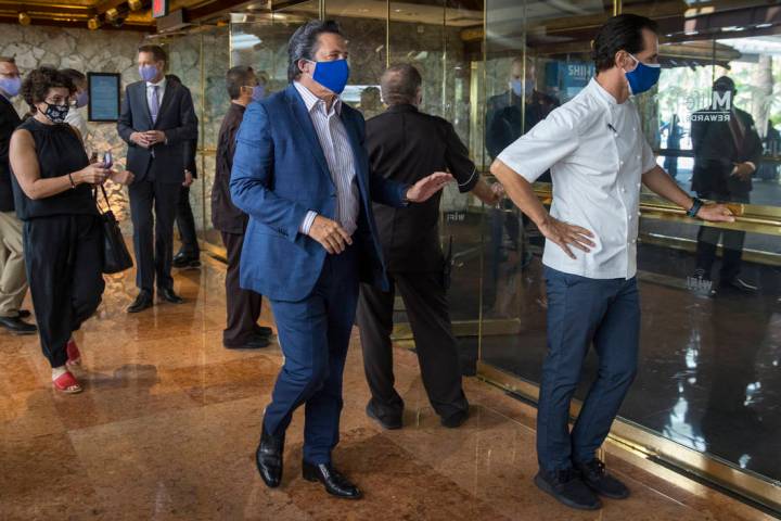 CEO and President of MGM Resorts International Bill Hornbuckle, center, assembles his employees ...