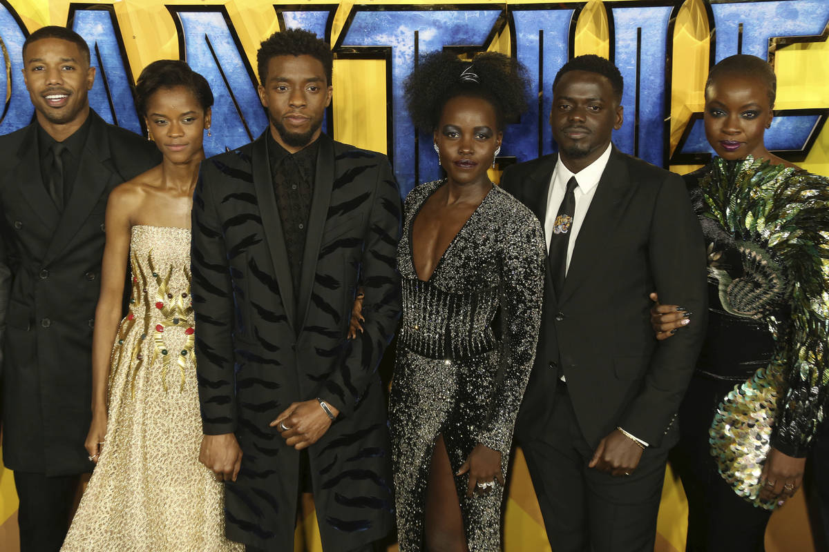 FILE - In this Feb. 8, 2018 file photo, actors Michael B. Jordan, Leitia Wright, Chadwick Bosem ...