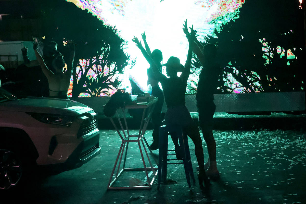 Audience members dance with performers in Salvage City, a partnership of Insomniac and Spiegelw ...