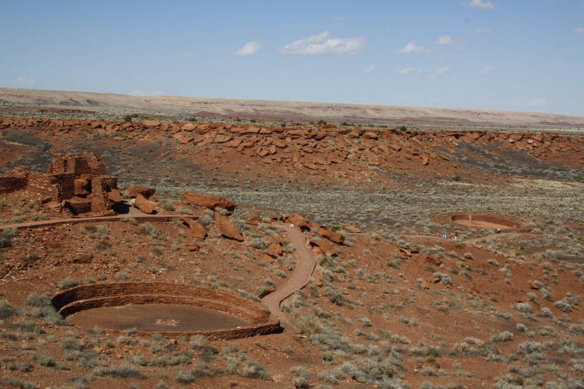 The community room and ceremonial ball court are located just a short walk downhill from Wupatk ...