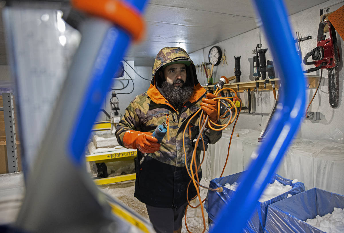 Marco Villarreal, known as "Vegas Ice Man," prepares to start working on an ice sculp ...