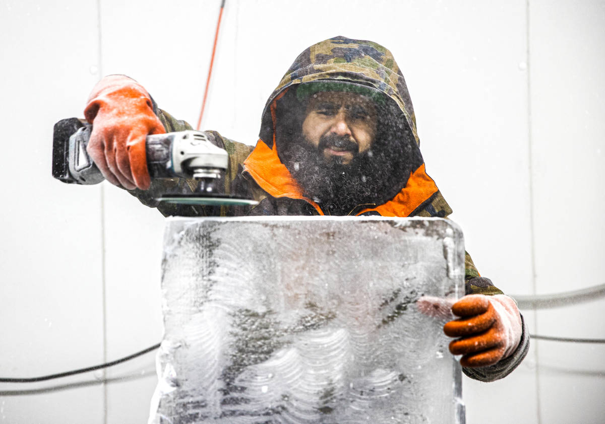 Marco Villarreal, known as "Vegas Ice Man," works on an ice sculpture on Tuesday, Sep ...