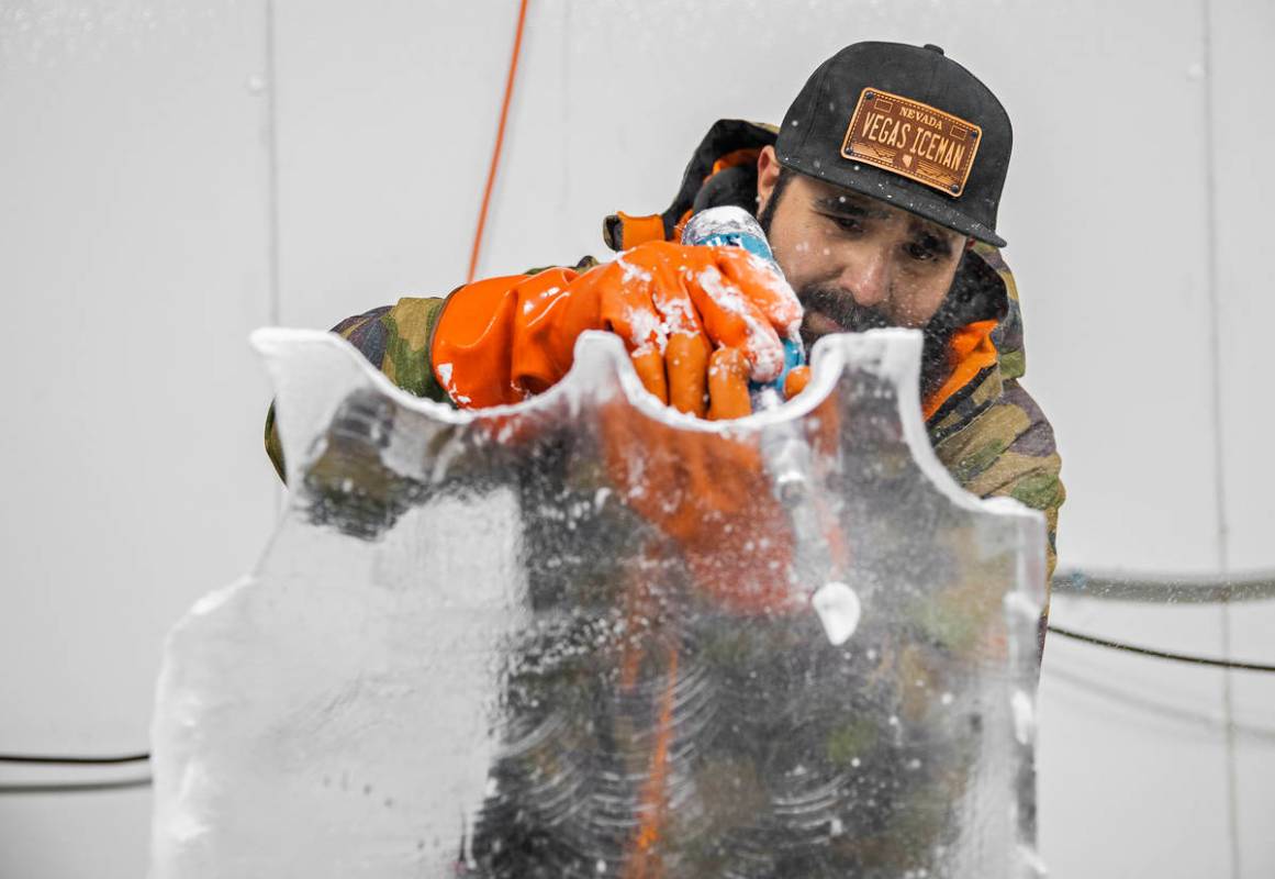 Marco Villarreal, known as "Vegas Ice Man," works on an ice sculpture on Tuesday, Sep ...