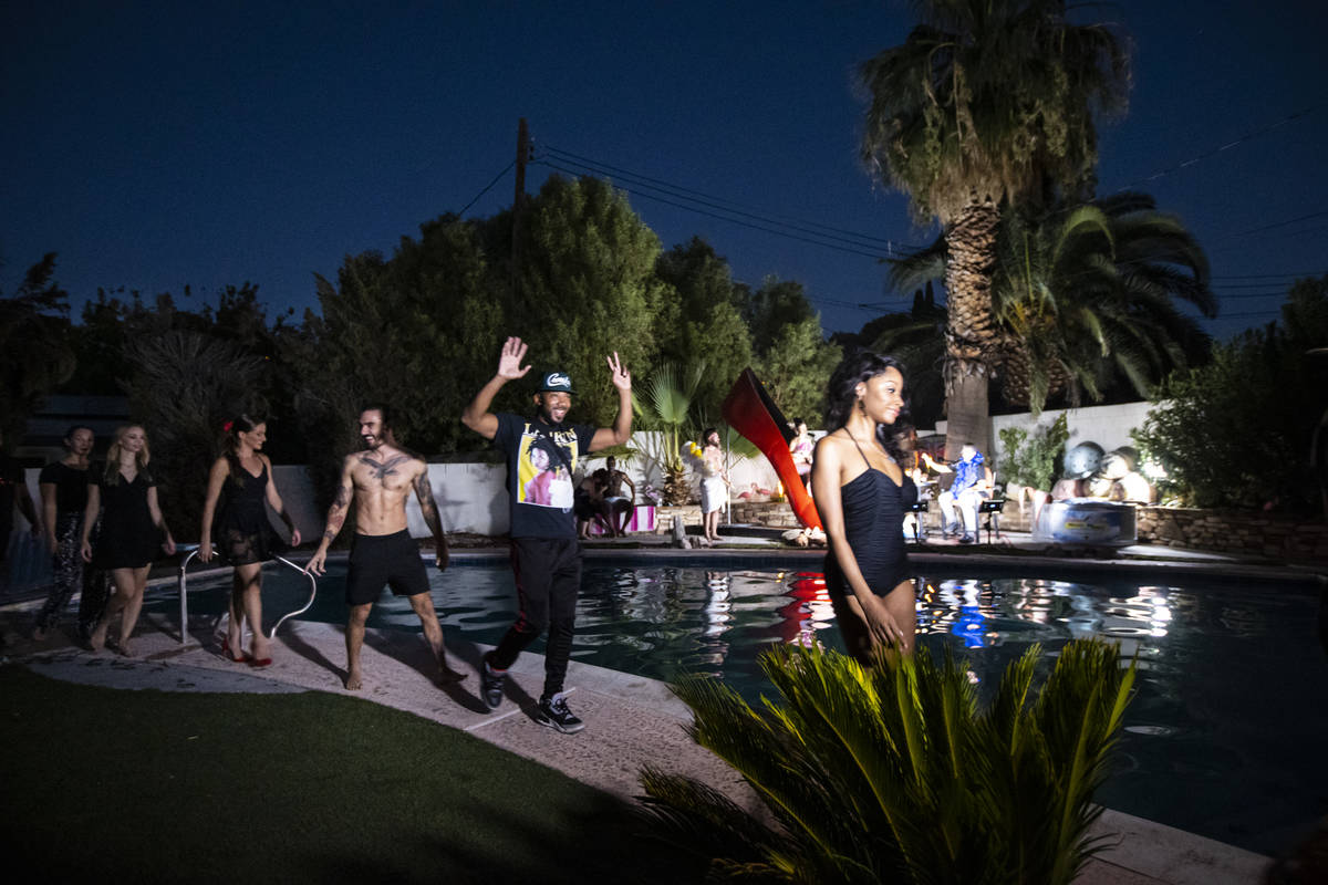Guests walk by at the end of the PodKats! "End of Summer bash" with Melody Sweets and John Kats ...