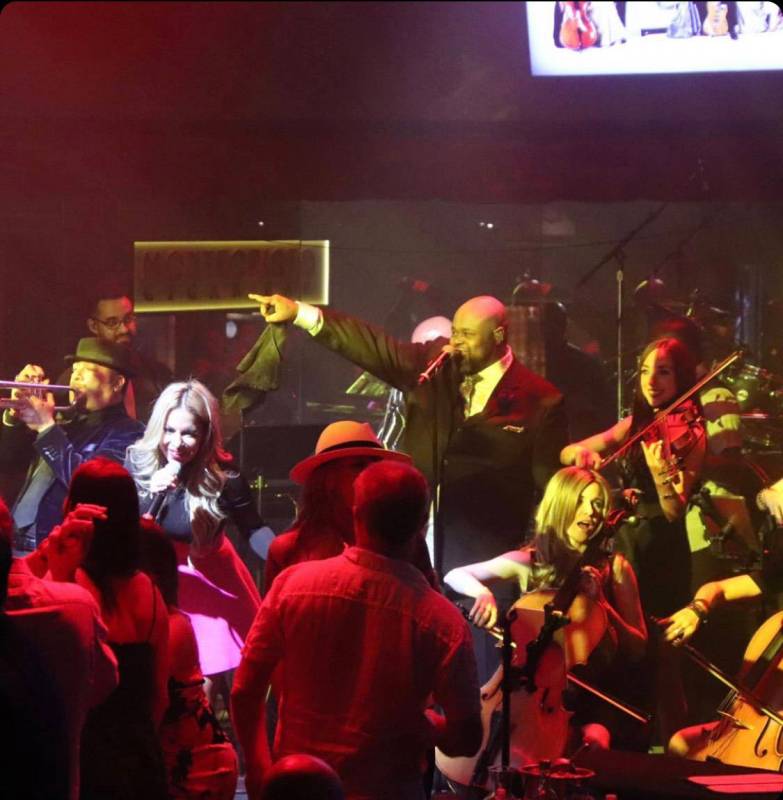 Bruce Williamson is shown with David Perrico's Pop Strings lineup at Cleopatra's Barge at Caesa ...