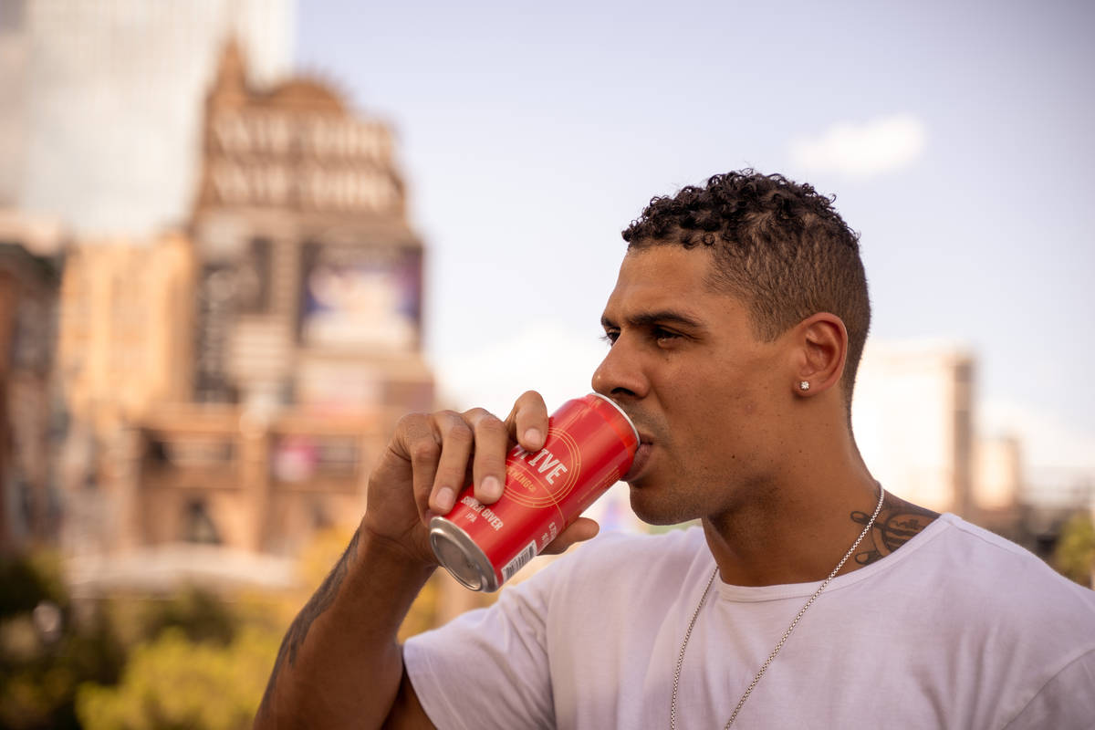 Ryan Reaves quaffs his latest 7Five Brewing Company's new beer, Shiver Giver IPA. (7Five Brewin ...