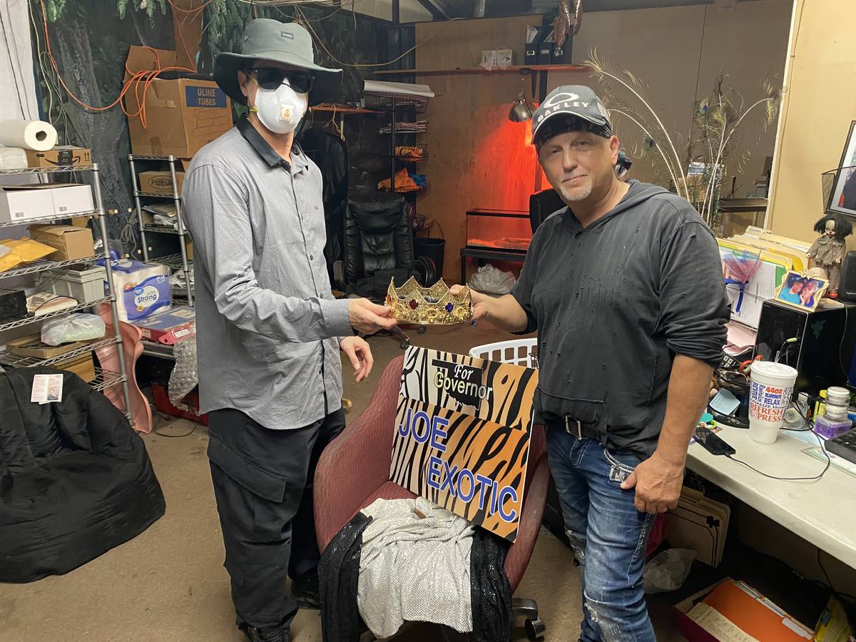 Zak Bagans and Jeff Lowe are shown with Joe Exotic's infamous crown at the Greater Wynnewood Ex ...
