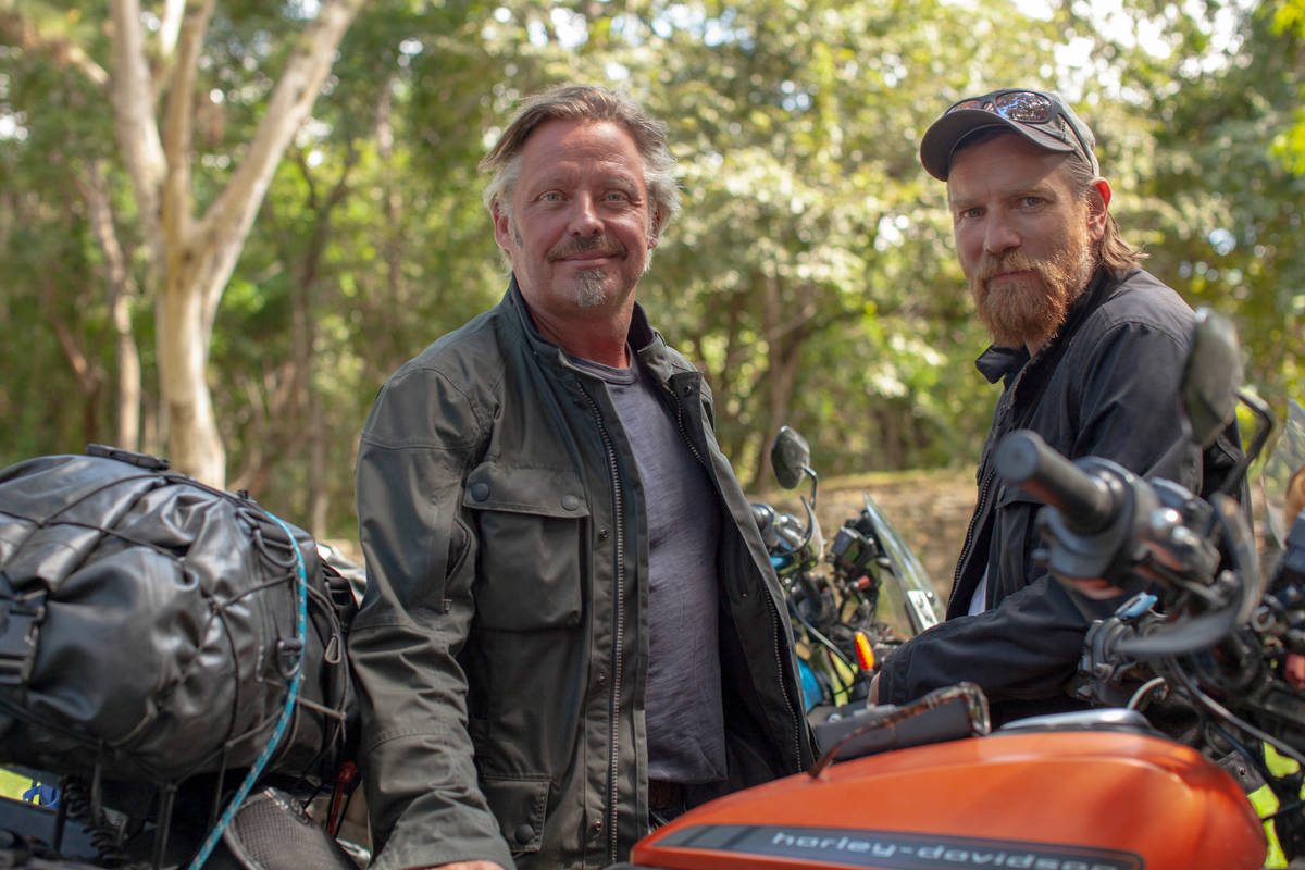 Charley Boorman, left, and Ewan McGregor in “Long Way Up." (Apple TV+)