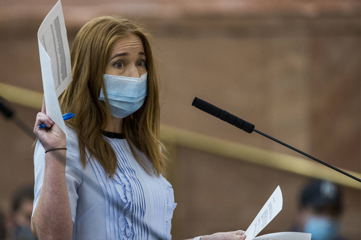 Owner Kristen Corral of Tacotarian restaurant holds up letters from fellow restaurant owners wh ...