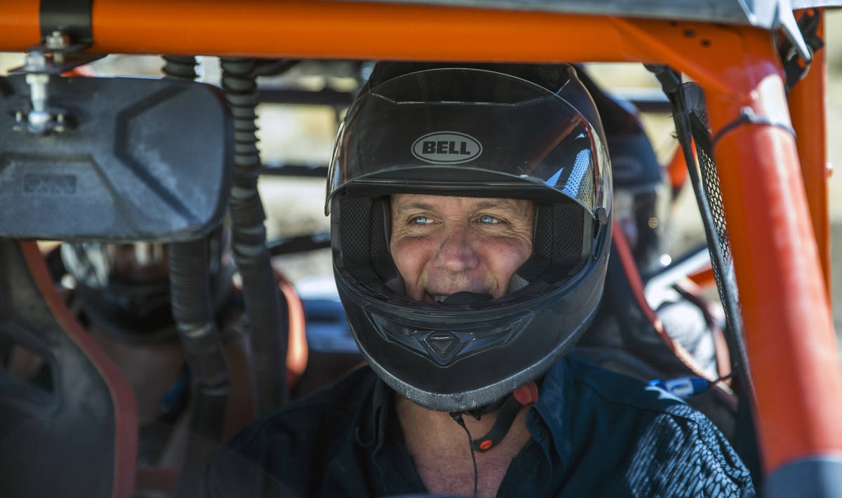 Adrenaline Mountain owner and CEO Eric Brashear wears a safety helmets as he readies to hit the ...
