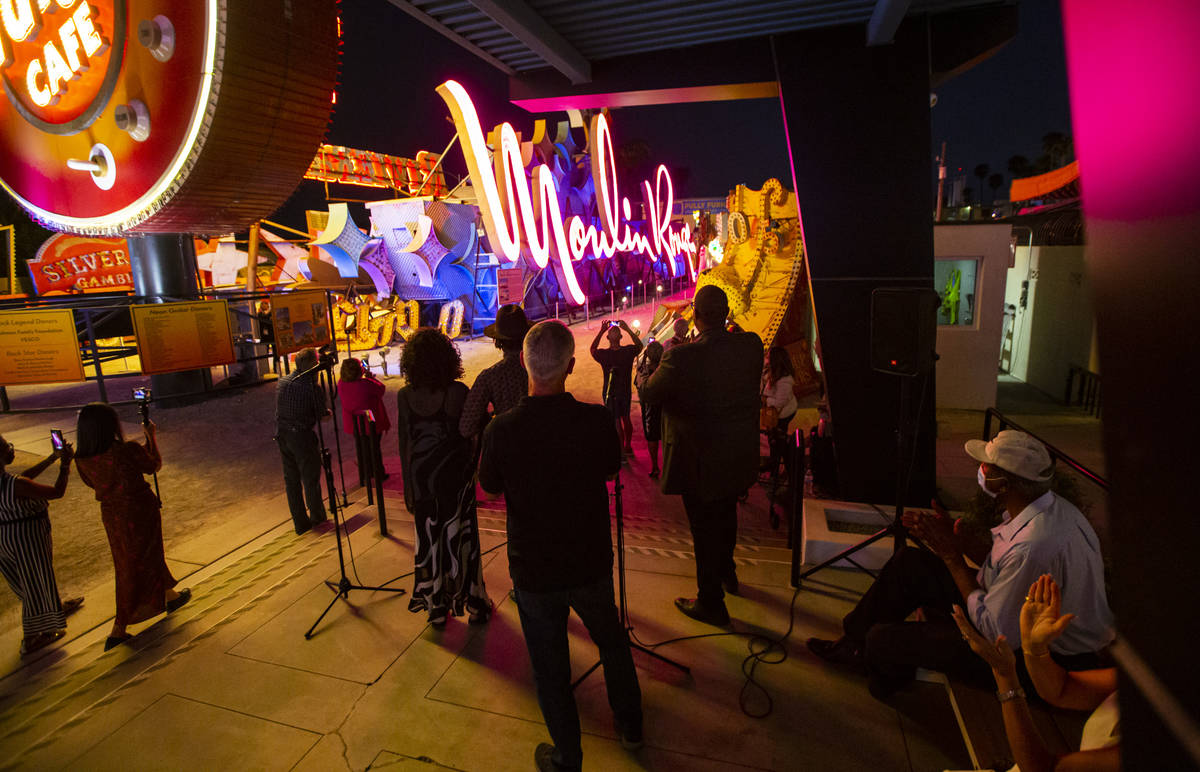 Rob McCoy, president and CEO of the Neon Museum,ʣenter, watches alongside Dee Dee Jasmine ...