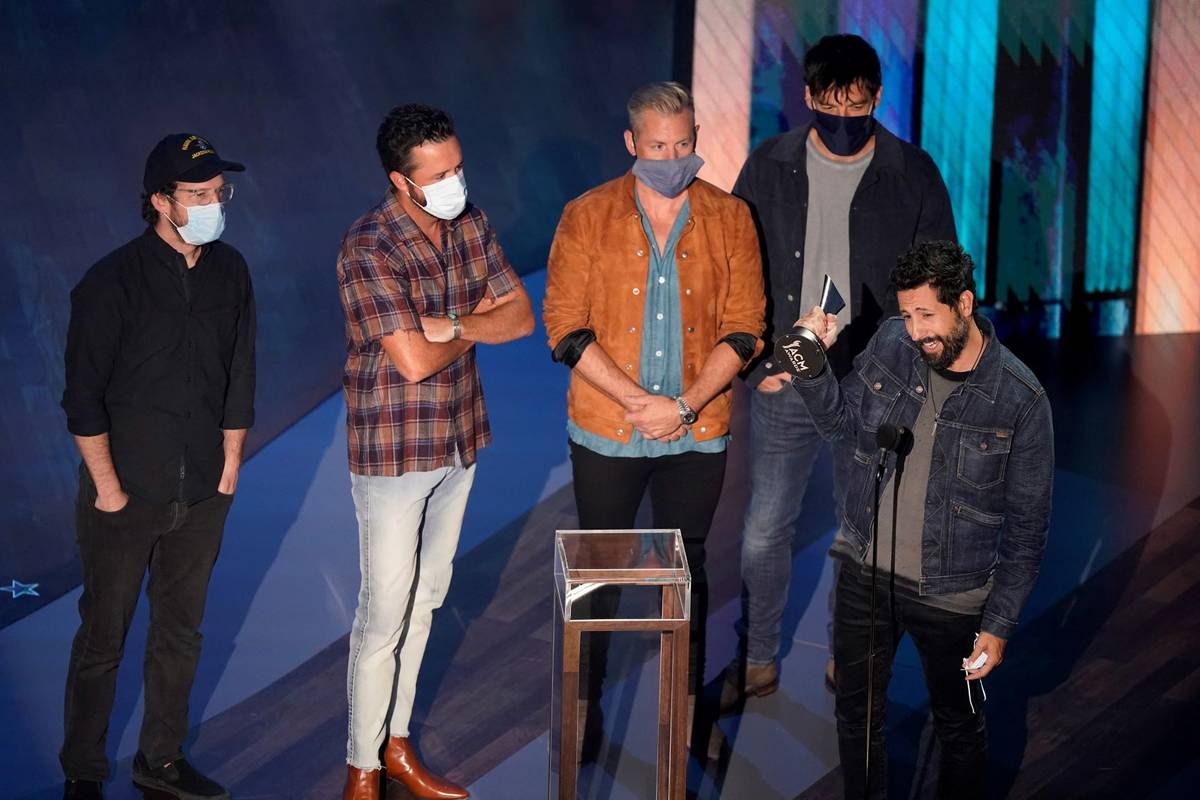 Old Dominion accepts the group of the year award during the 55th annual Academy of Country Musi ...