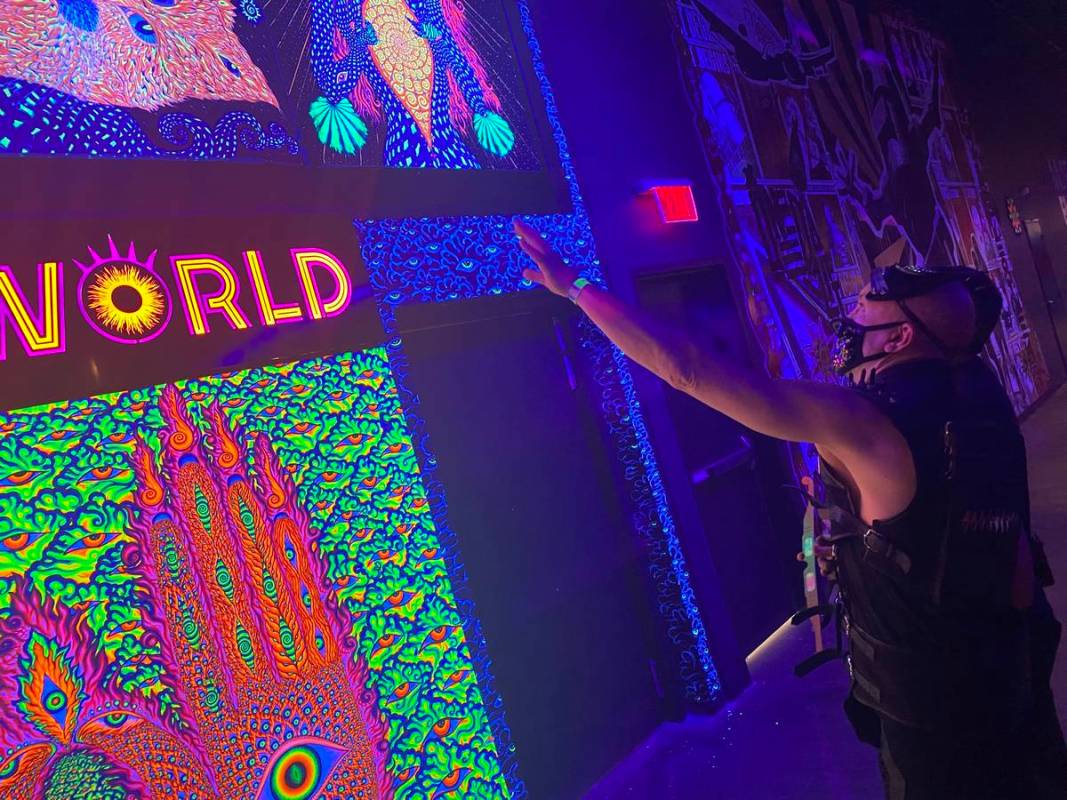Area15 Director of Content Chris Wink is shown at the entrance of Wink World, designed by artis ...