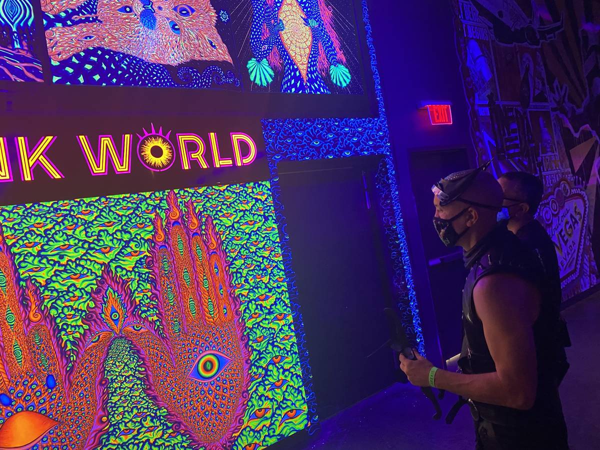 Area15 Director of Content Chris Wink is shown at the entrance of Wink World, designed by artis ...