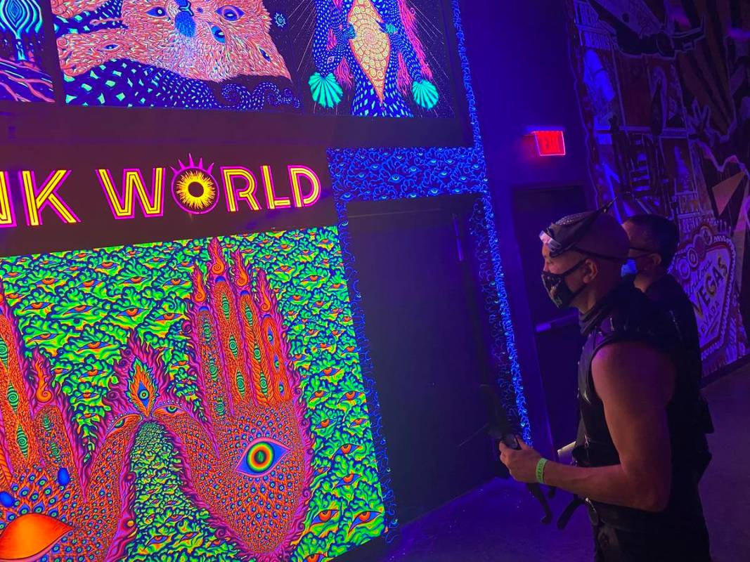 Area15 Director of Content Chris Wink is shown at the entrance of Wink World, designed by artis ...