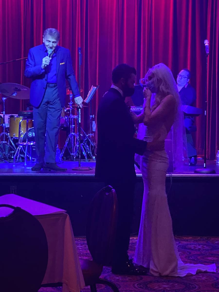 Carmine Mandina sings to a pair of newlyweds at Italian American Club on July 26, 2020. (John K ...