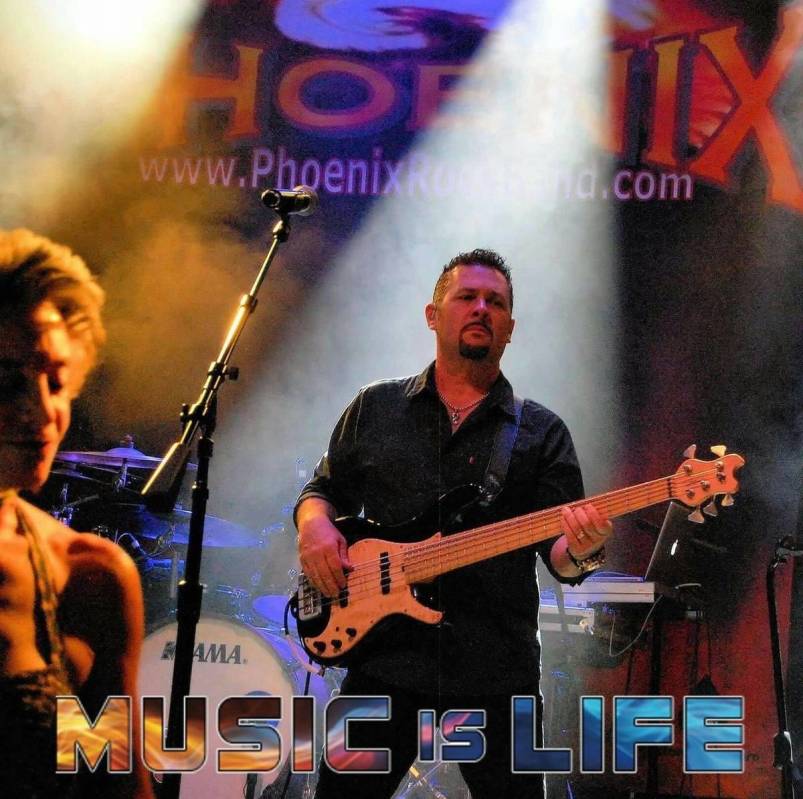 Ray Allaire, shown here with the rock-cover band Phoenix, has left Las Vegas for a village in B ...