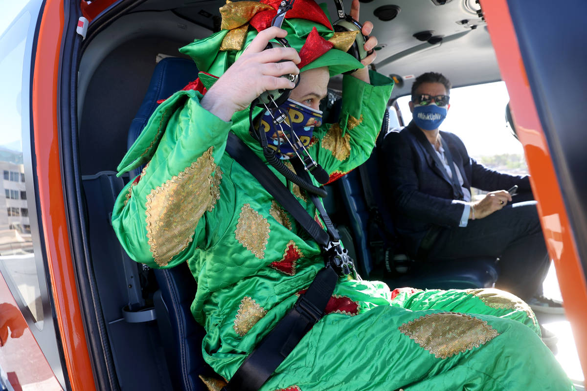 Piff the Magic Dragon and Las Vegas Review-Journal columnist John Katsilometes prepare for a fl ...