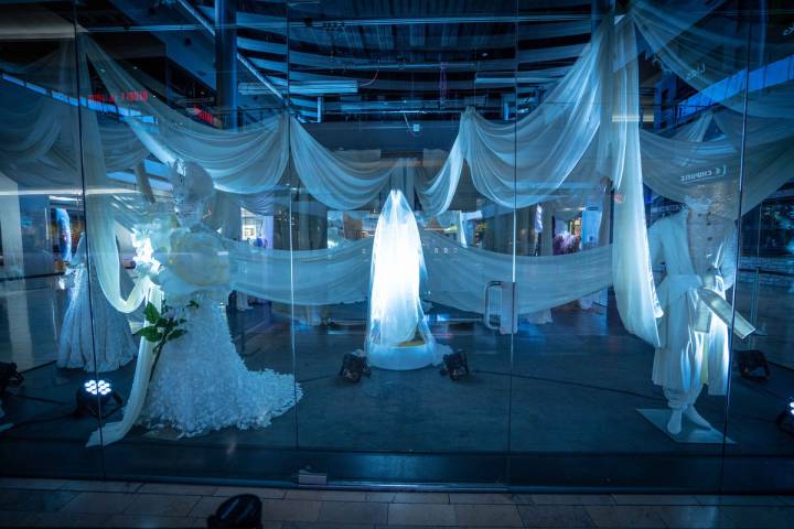 The Great Hall to snap photos of a spider web installation and mummy fashion exhibit. (Fashion ...