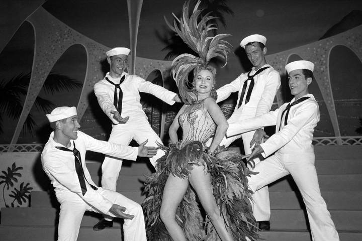 FILE - In this May 20, 1957 file photo, Actress Rhonda Fleming blossoms out as a singer and dan ...