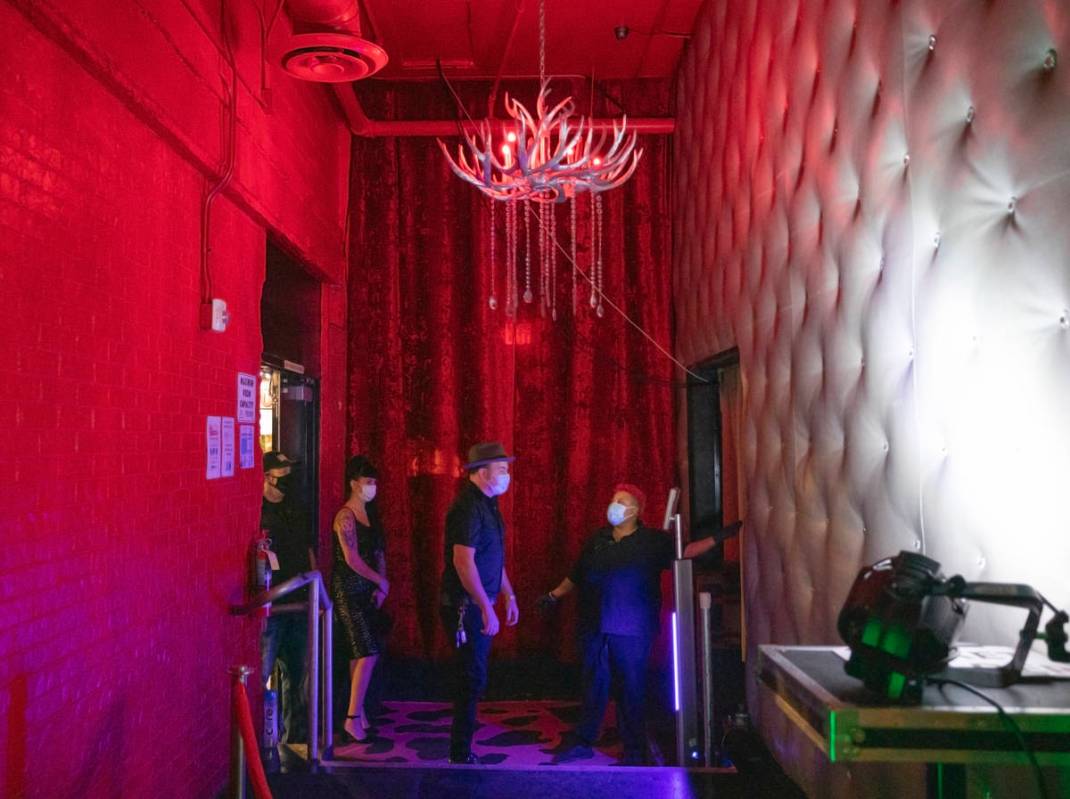 Individuals arrive and have their temperature checked at the Fremont Country Club, for live mus ...