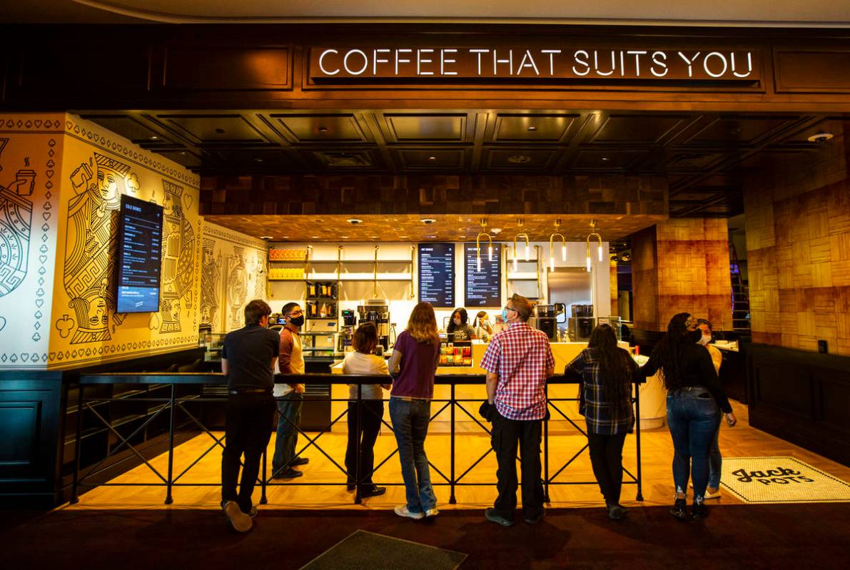 People wait for for drinks at the Jack Pots coffee stand during a tour of Circa, the first from ...