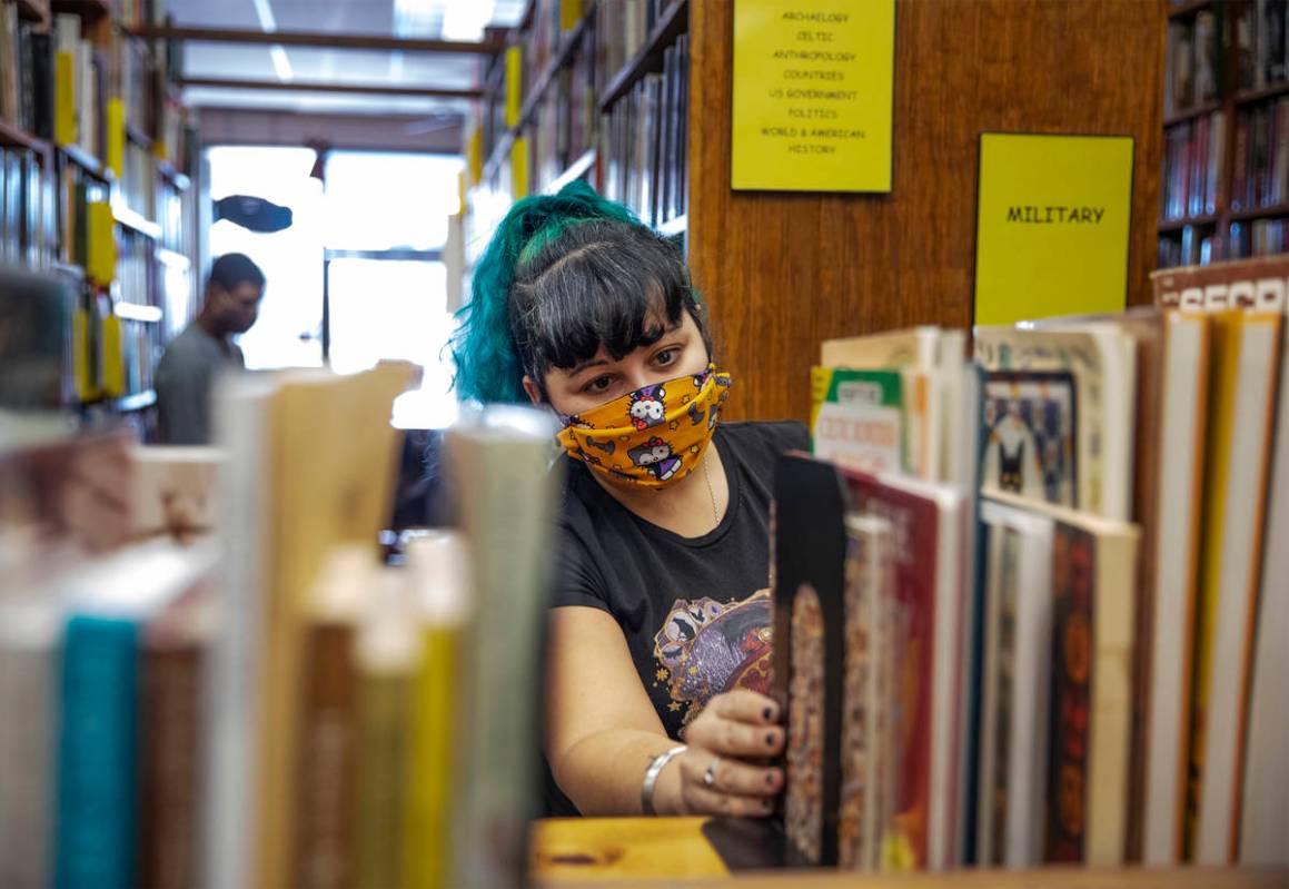 Mad Ange Khan shops for books at Amber Unicorn Books in Las Vegas, Wednesday, Oct. 21, 2020. Th ...