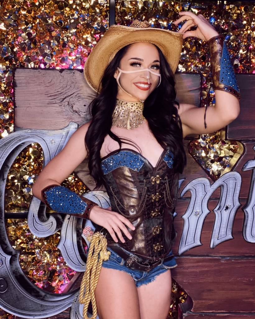"X Country" cast member Shelby Jordan shows off her new face mask as the show has returned to H ...