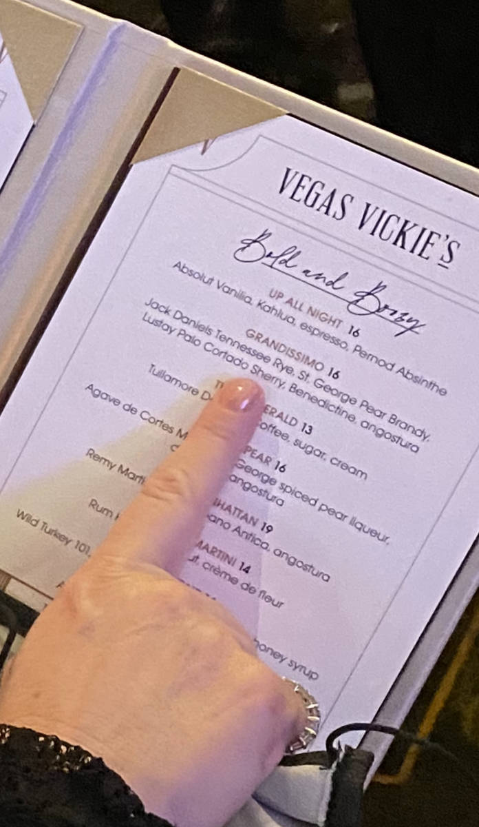 Heidi Sarno Strauss points to the Grandissimo cocktail at Vegas Vickie's Cocktail Lounge on Tue ...