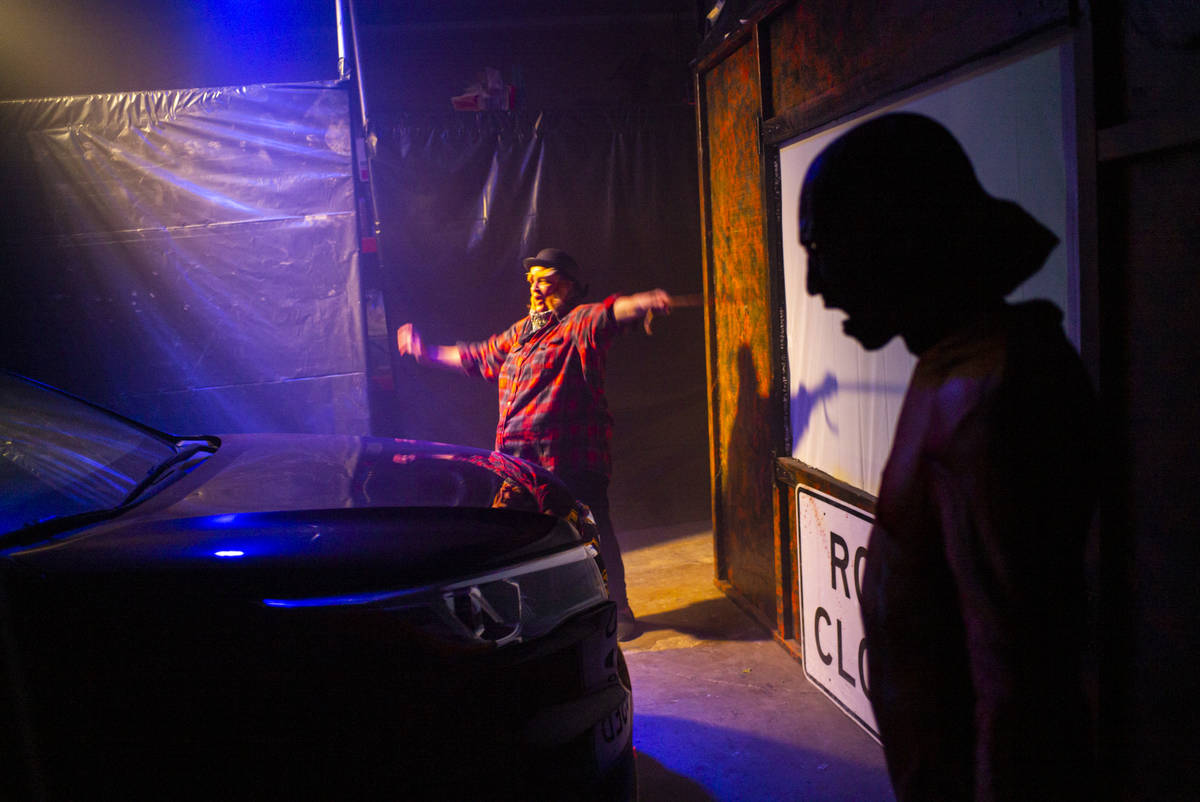 Roxanne Farrar, left, and Randy Hample perform during the Horrorwood Video drive-in at the Maje ...