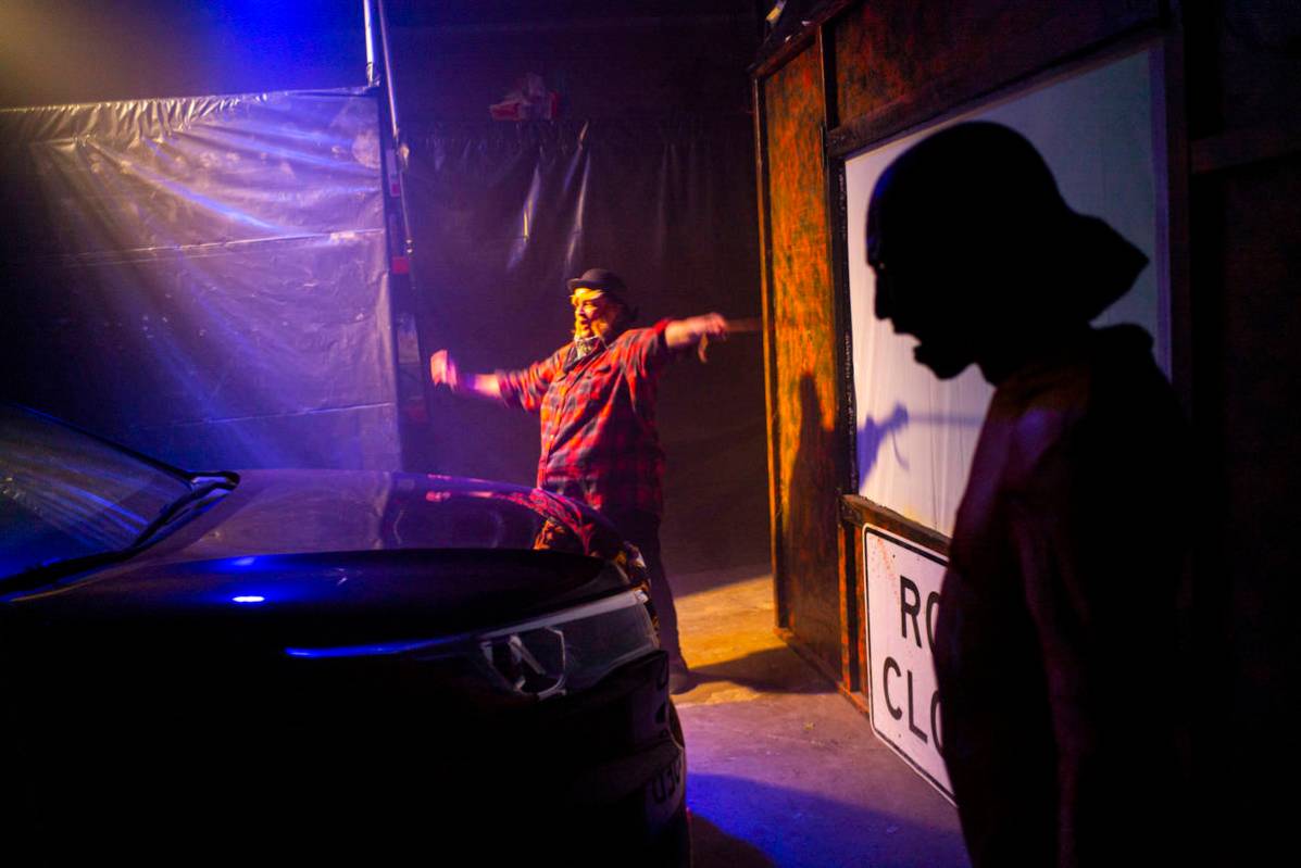 Roxanne Farrar, left, and Randy Hample perform during the Horrorwood Video drive-in at the Maje ...