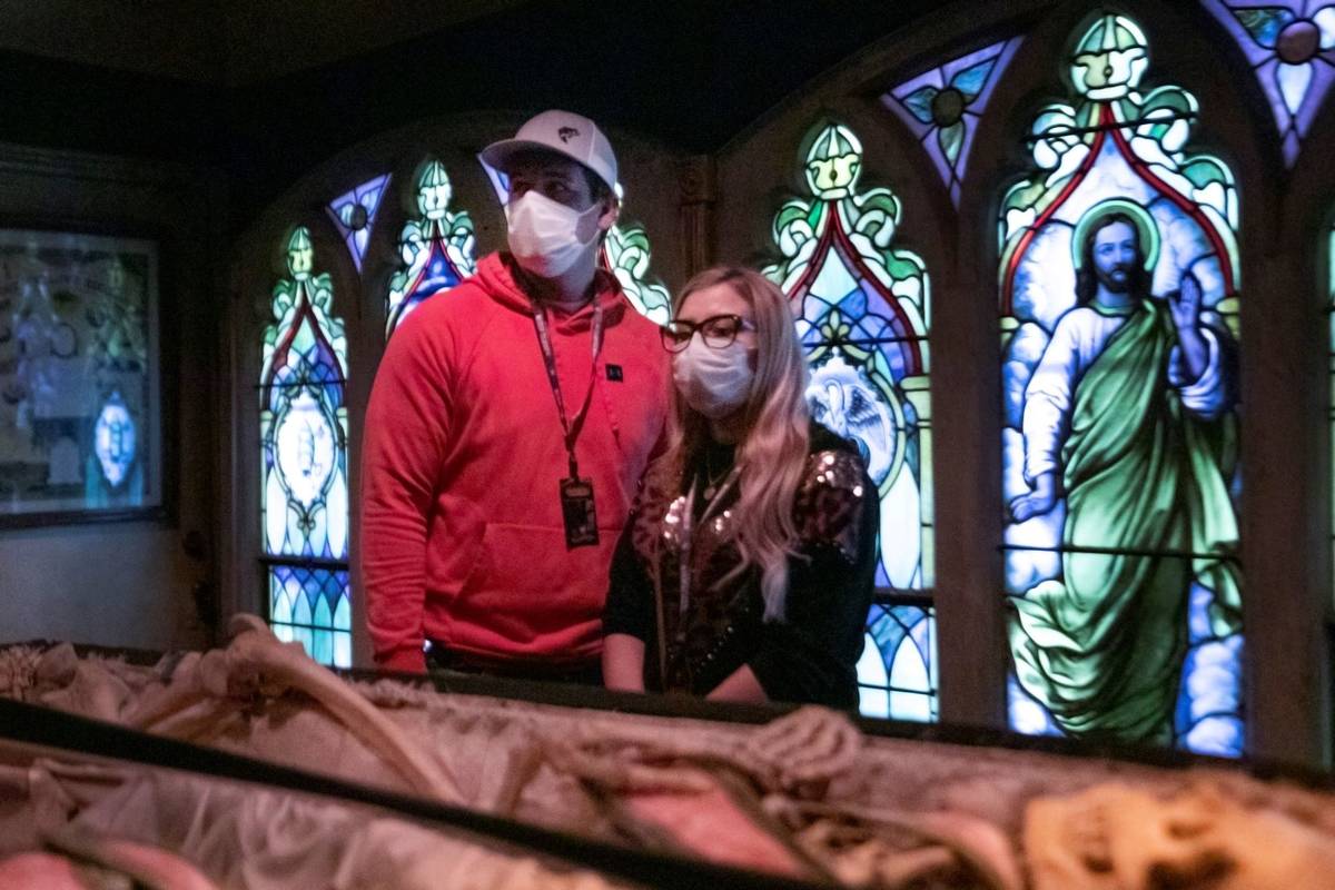 Greer Pope , 25, left, and Brittany Pope, 28, of Jackson, Georgia, look at the Odd Fellows room ...