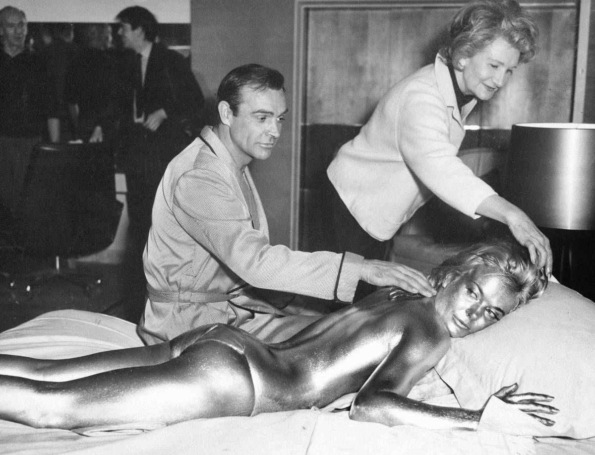 FILE - In this file photo dated April 20, 1964, James Bond, alias, Sean Connery, finds himself ...