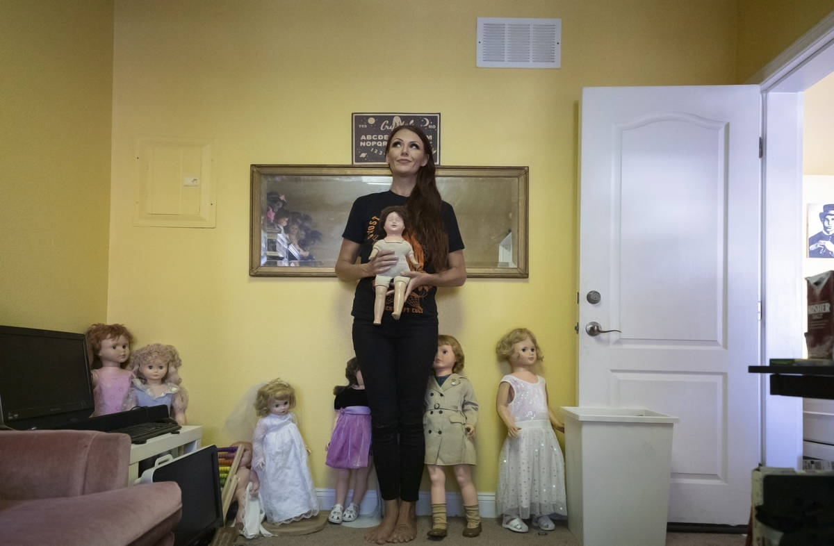 Paranormal enthusiast Staysha Randall is seen in a room connected to her garage that houses ite ...