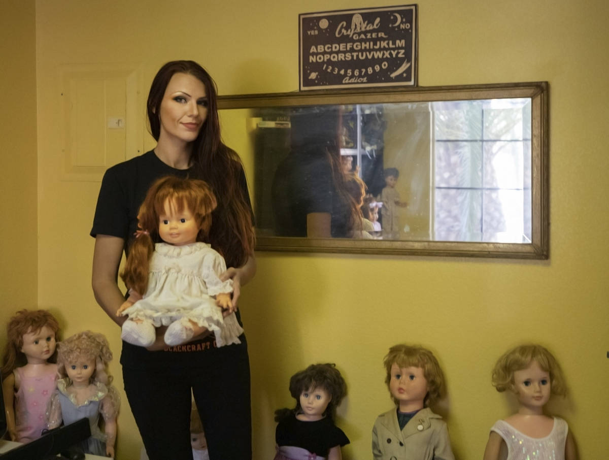 Paranormal enthusiast Staysha Randall is seen in a room connected to her garage that houses ite ...
