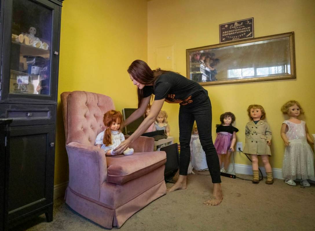 Paranormal enthusiast Staysha Randall is seen in a room connected to her garage that houses ite ...