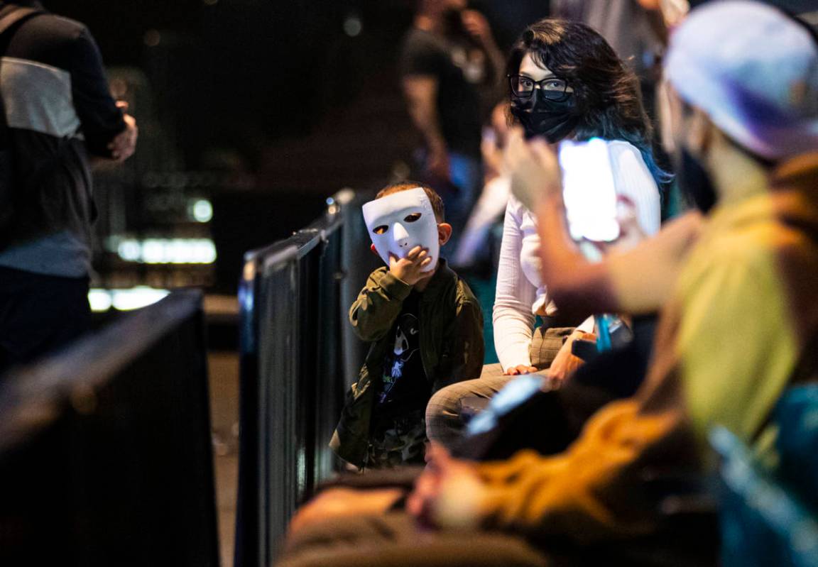 People pose in their Jabbawockeez masks before the beginning of the group's new production, &qu ...