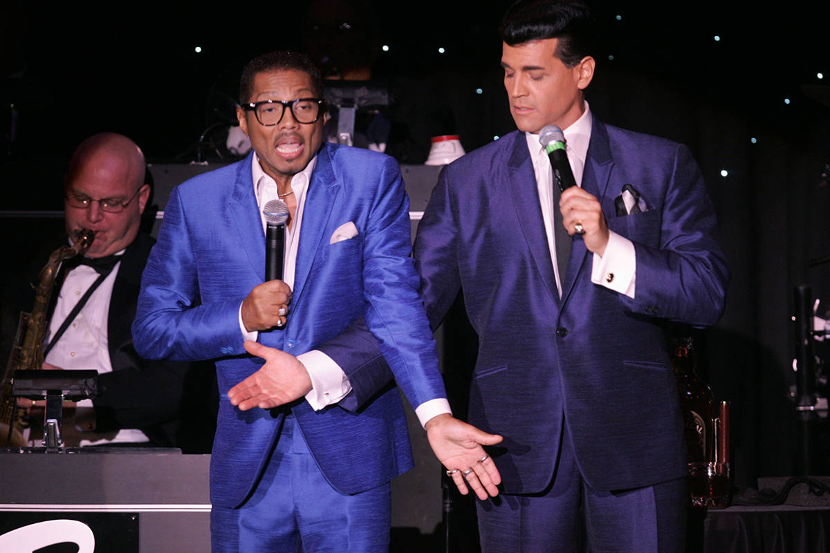 Tribute artists Kyle Diamond, left, as Sammy Davis Jr. and Johnny Edwards as Dean Martin, sing ...