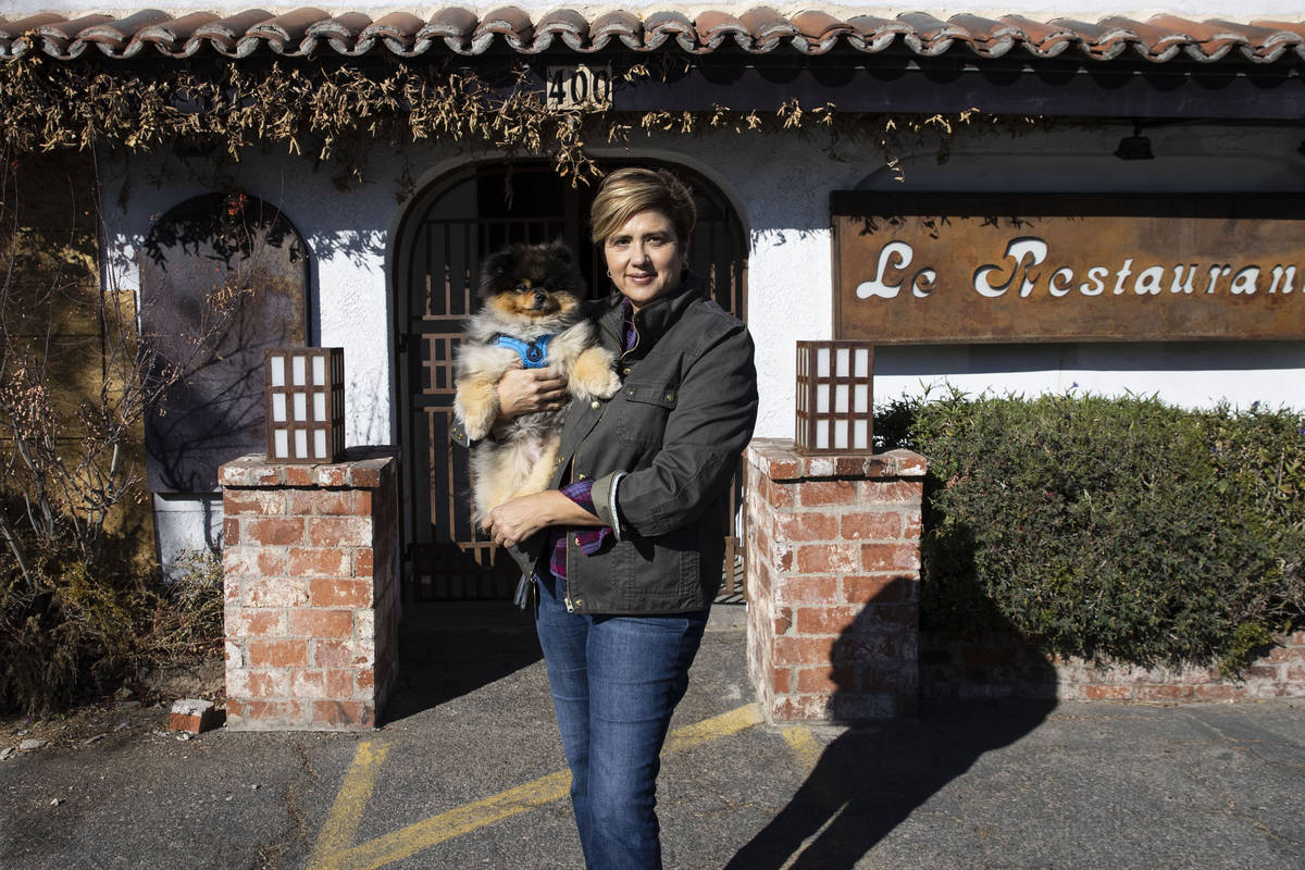 Diana Maisondieu-LaForge, owner of Pamplemousse restaurant, poses for a photo with her dog, Jac ...
