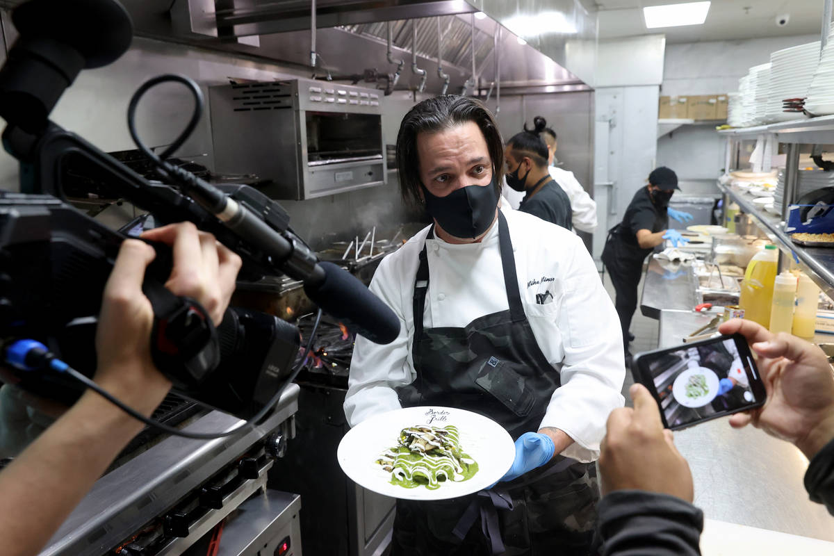 Chef Mike Minor made Chicken Poblano Enchiladas at Border Grill at Mandalay Bay in July. The ch ...