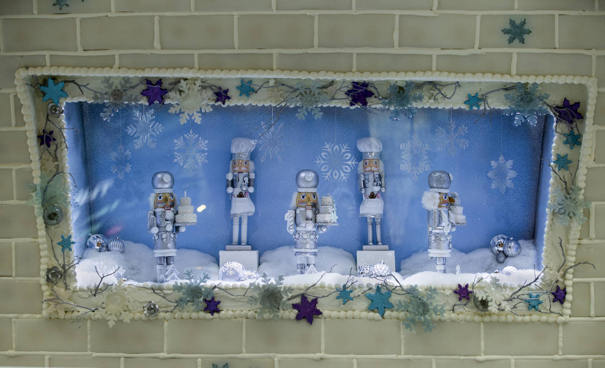 Nutcrackers spin in a picture window at Aria's Sugar Palace lobby display unveiled today in Las ...