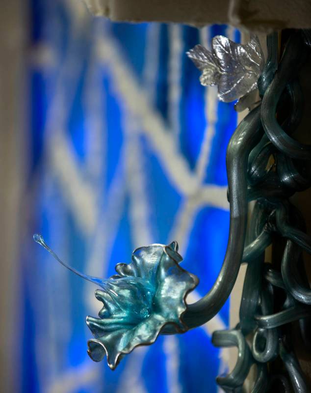 A pulled sugar technique is used to create flowers and vines. L.E. Baskow/Las Vegas Review-Jour ...