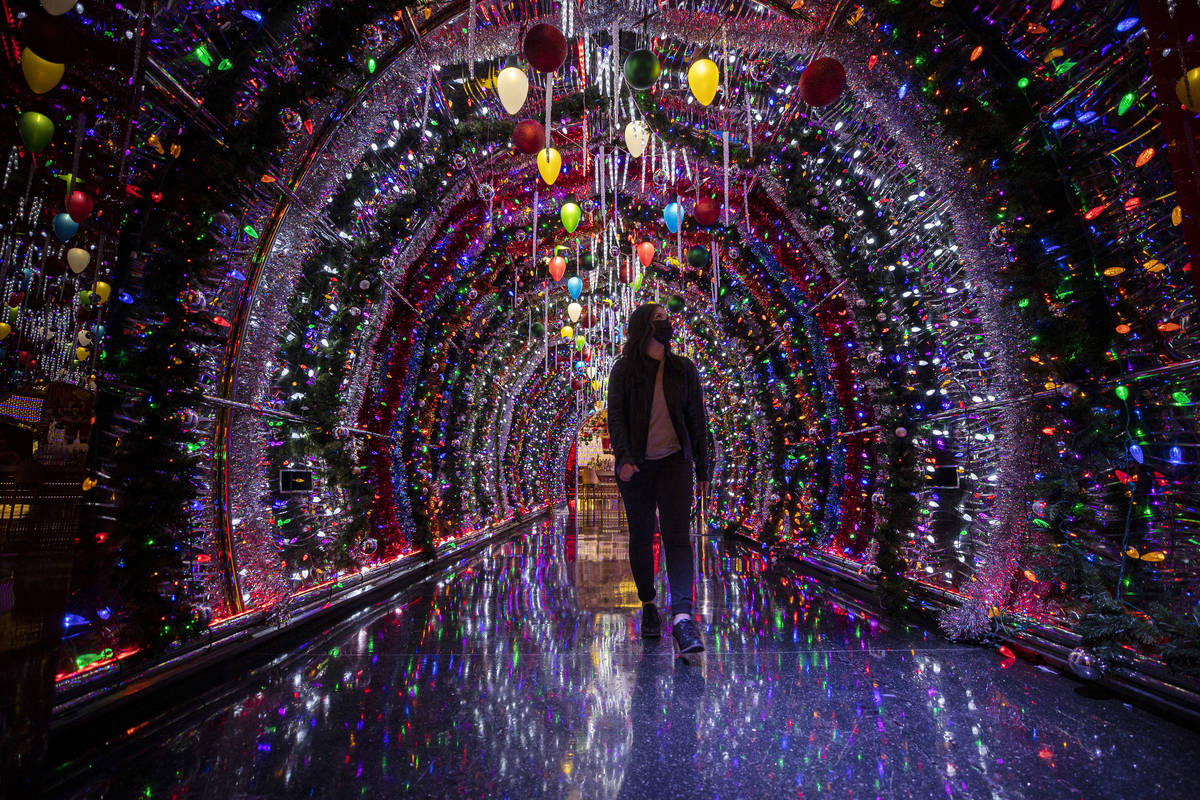 Katrina Albana walks through a hallway lit with thousands of bulbs leading to the main lounge a ...