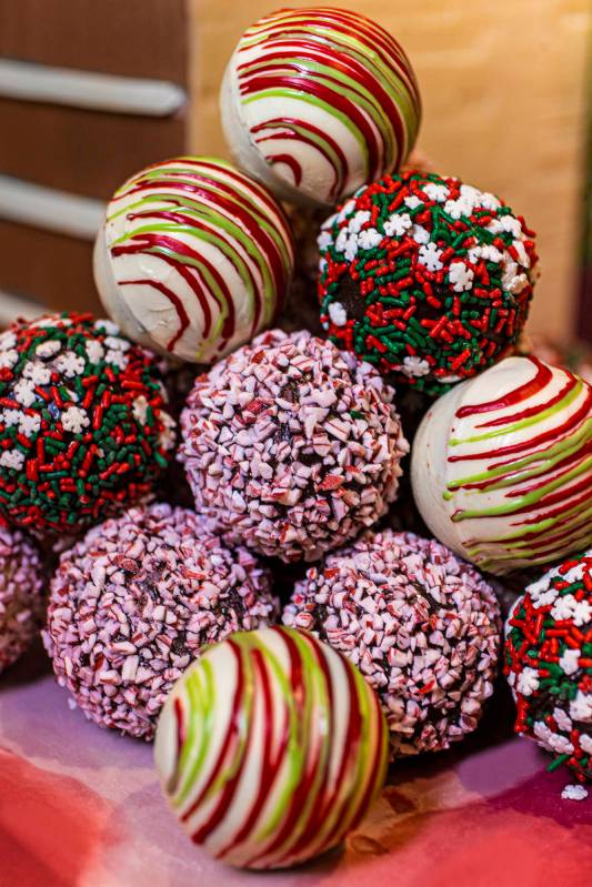 Cocoa bombs, the signature ingredient in a hot cocoa bomb cocktail, are chocolate balls filled ...